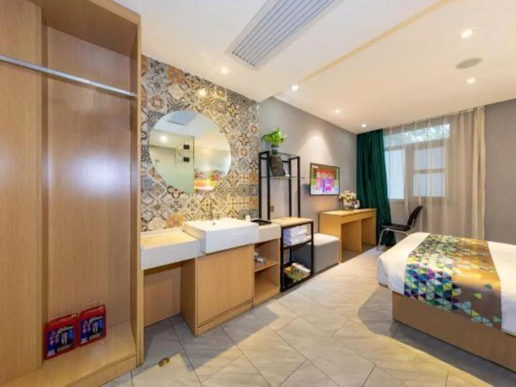 Bed in ZMAX Hotel Beijing Tongzhou Universal Tourist Resort Linheli Metro Station