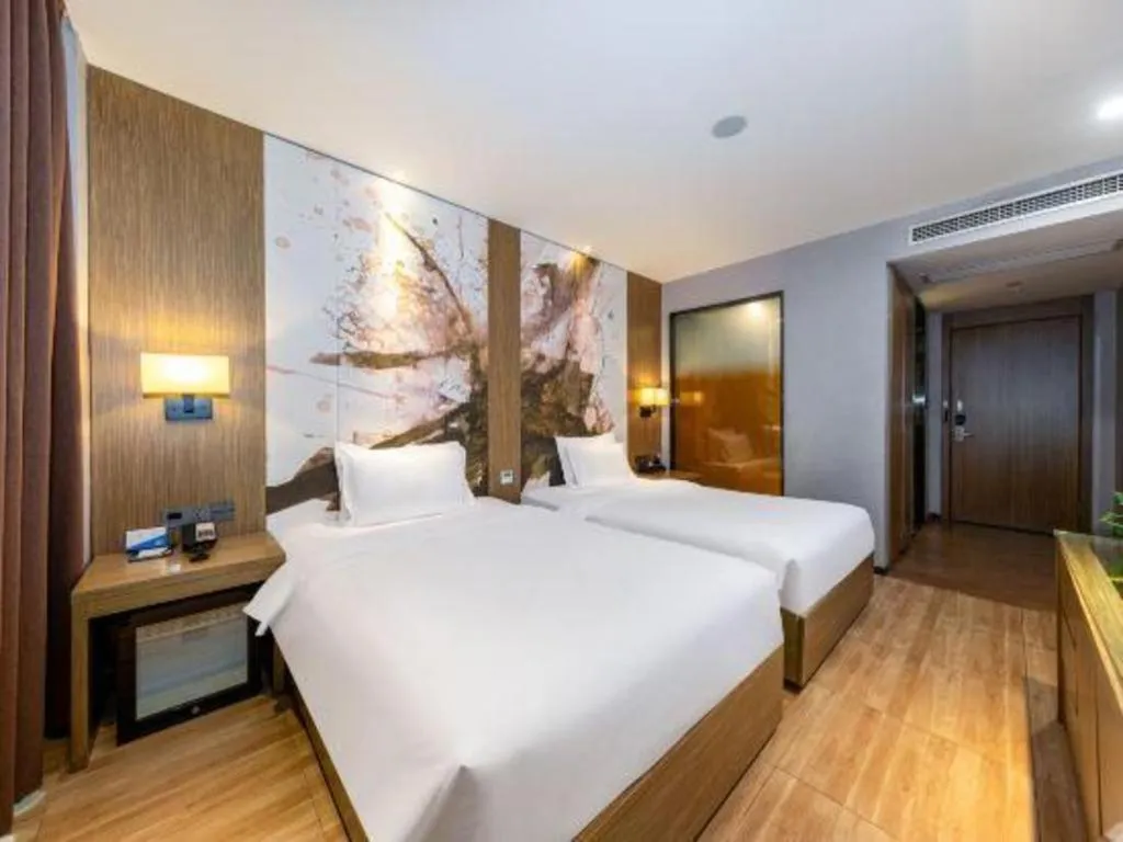 Bed in ZMAX Hotel Beijing Tongzhou Universal Tourist Resort Linheli Metro Station