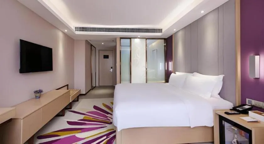 Bed in Lavande Hotel Lu County High-Speed Railway Station Wanhu Daduhui