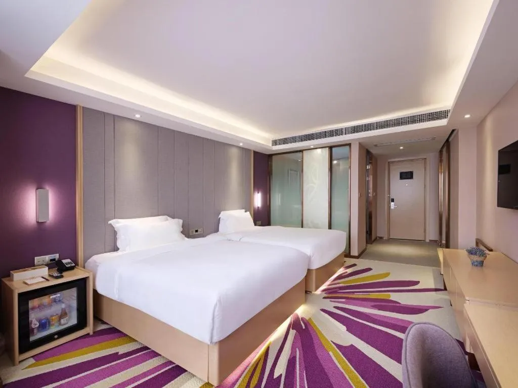 Bed in Lavande Hotel Lu County High-Speed Railway Station Wanhu Daduhui