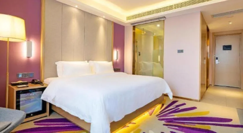 Bed in Lavande Hotel Lu County High-Speed Railway Station Wanhu Daduhui