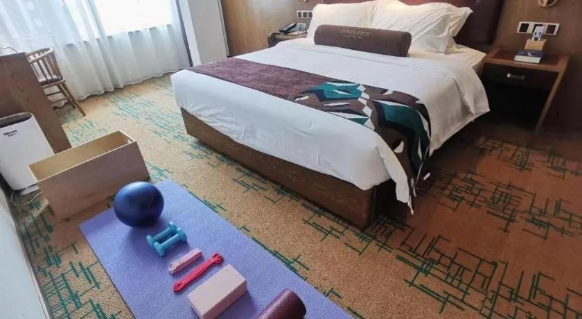 Bed in James Joyce Coffetel Beijing Pinggu Hospital Century Square