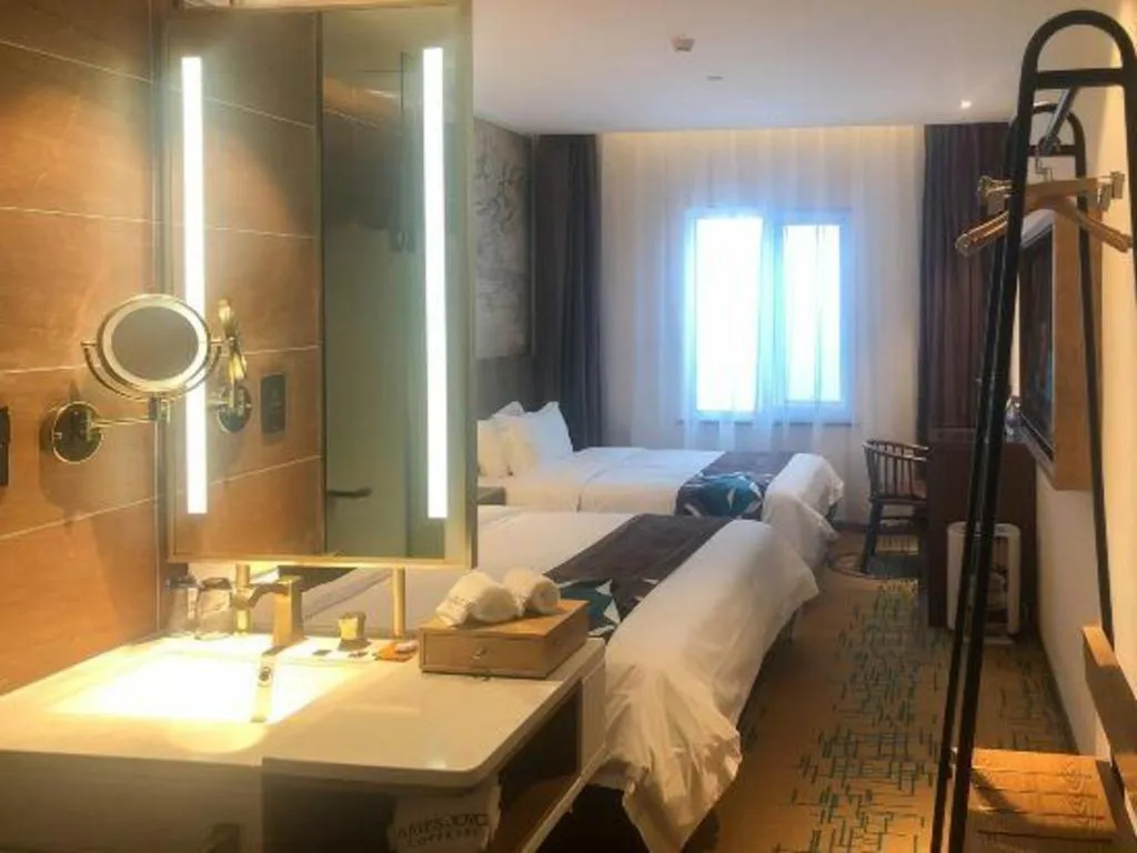 Bed in James Joyce Coffetel Beijing Pinggu Hospital Century Square