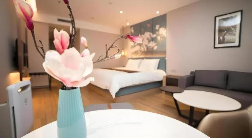 Bed in Magnotel Huludao Xingcheng Central Square Wenquan Street