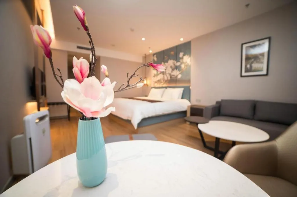 Bed in Magnotel Huludao Xingcheng Central Square Wenquan Street