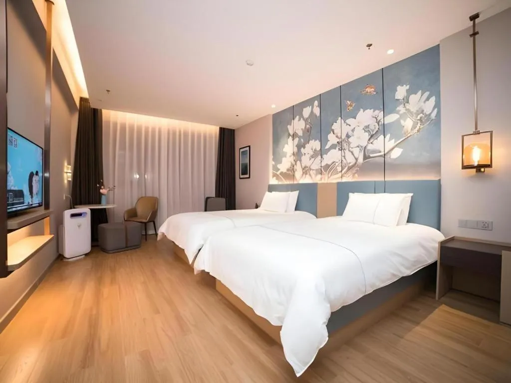 Bed in Magnotel Huludao Xingcheng Central Square Wenquan Street