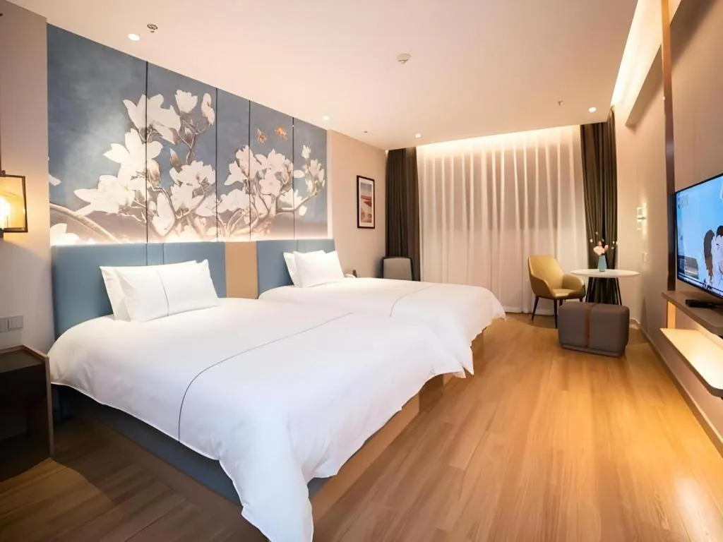 Bed in Magnotel Huludao Xingcheng Central Square Wenquan Street