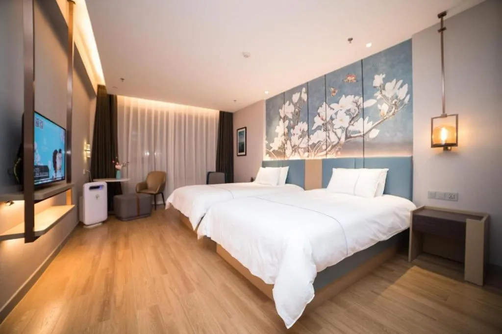 Bed in Magnotel Huludao Xingcheng Central Square Wenquan Street