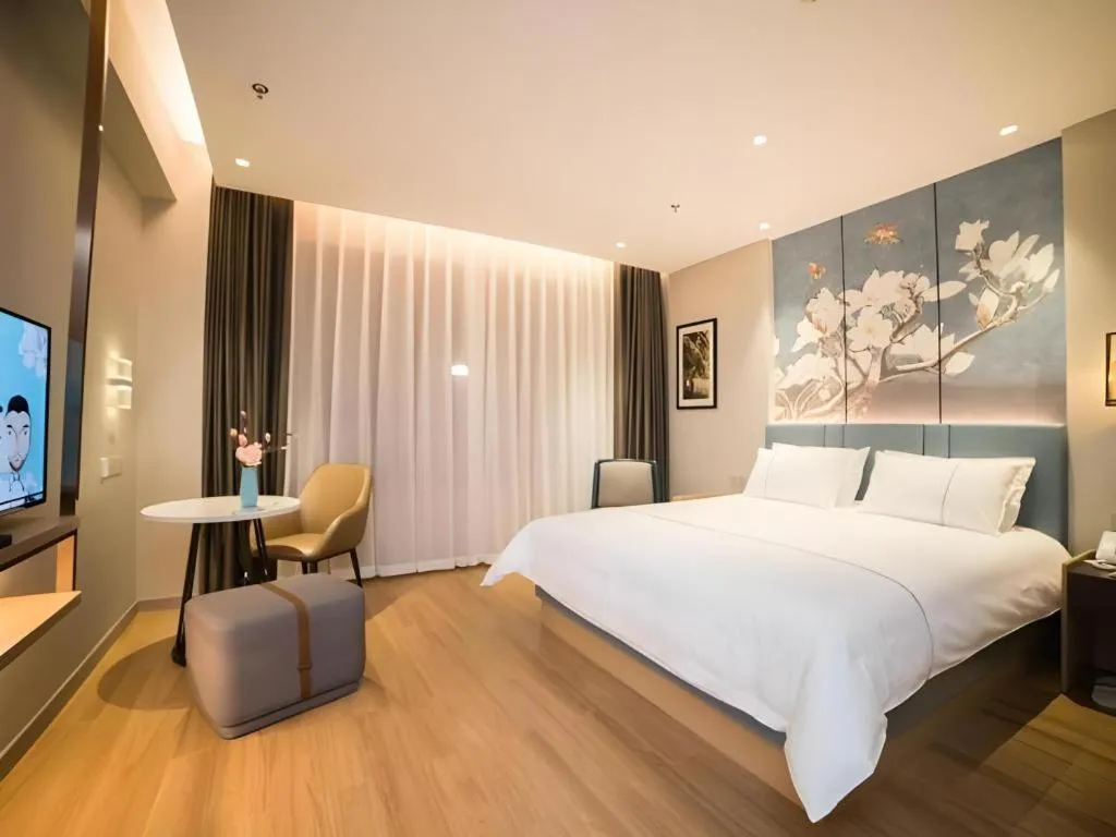 Bed in Magnotel Huludao Xingcheng Central Square Wenquan Street