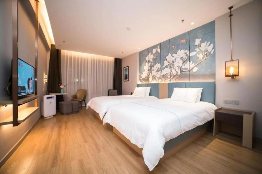 Bed in Magnotel Huludao Xingcheng Central Square Wenquan Street