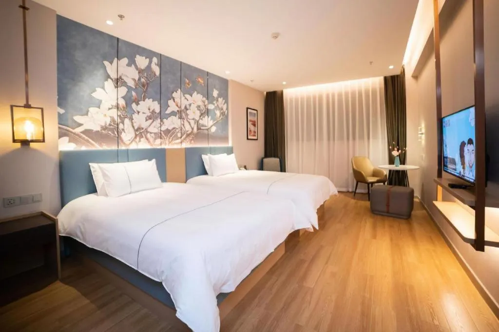 Bed in Magnotel Huludao Xingcheng Central Square Wenquan Street