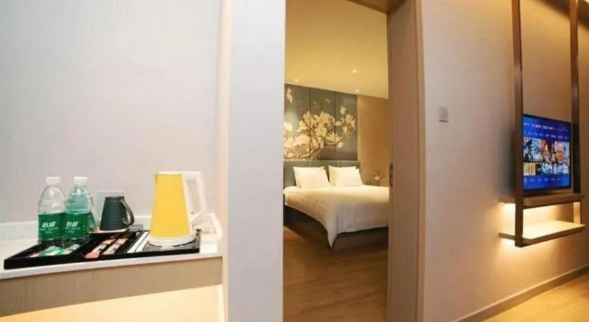 Bed in Magnotel Huludao Xingcheng Central Square Wenquan Street