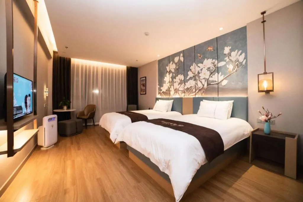 Bed in Magnotel Huludao Xingcheng Central Square Wenquan Street