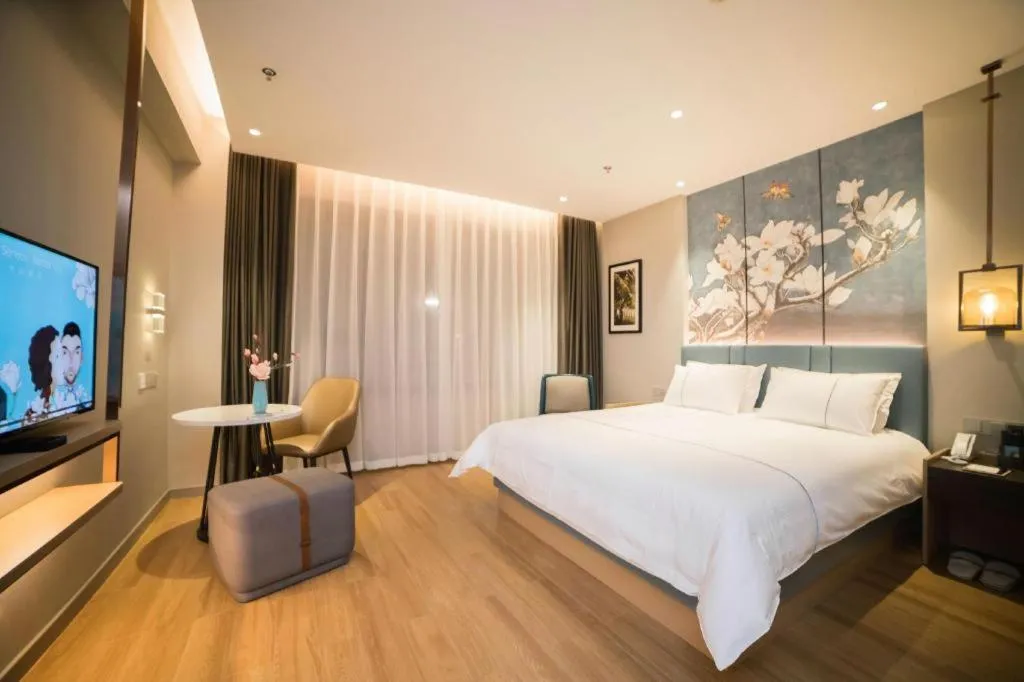 Bed in Magnotel Huludao Xingcheng Central Square Wenquan Street
