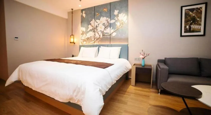 Bed in Magnotel Huludao Xingcheng Central Square Wenquan Street