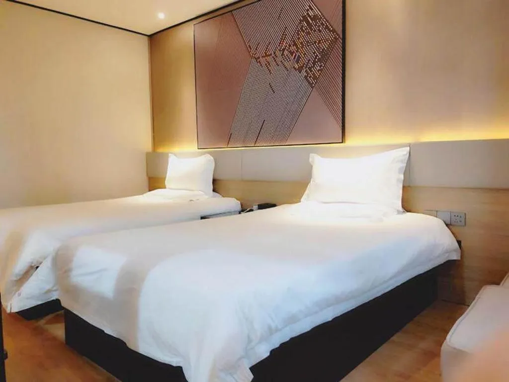 Bed in IU Hotel Xinyu Fenyi Mall
