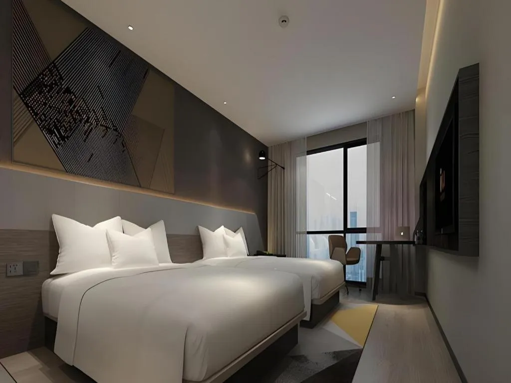 Bed in IU Hotel Xinyu Fenyi Mall