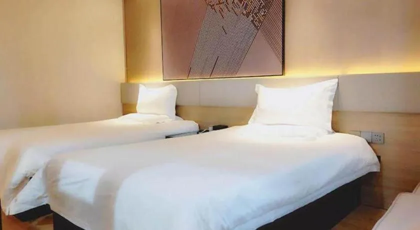 Bed in IU Hotel Xinyu Fenyi Mall