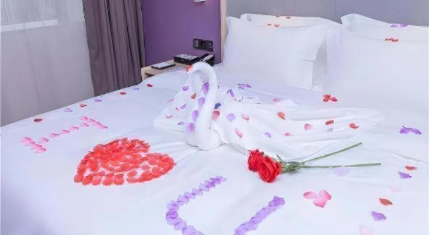 Bed in Lavande Hotel Guangzhou Zengchen Xintang Light Railway Station