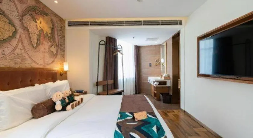 Bed in James Joyce Coffetel Shenyang North Railway Station Qishan Road Metro Station