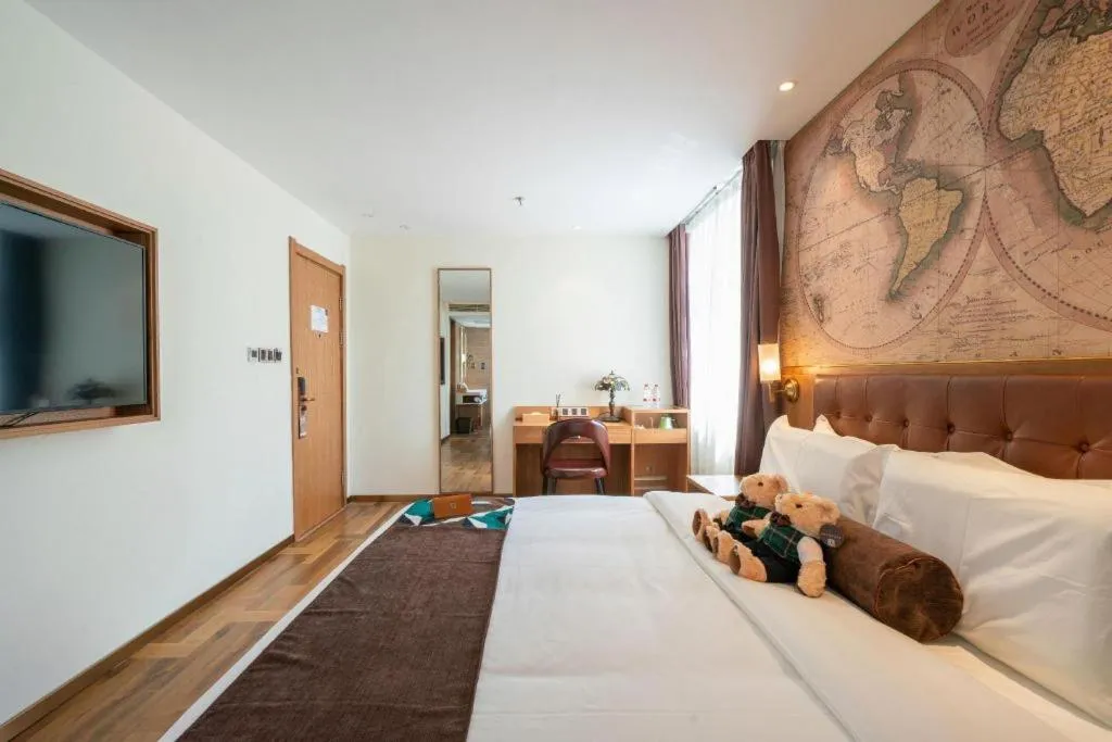 Bed in James Joyce Coffetel Shenyang North Railway Station Qishan Road Metro Station