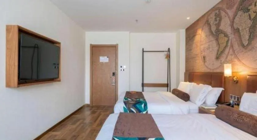 Bed in James Joyce Coffetel Shenyang North Railway Station Qishan Road Metro Station