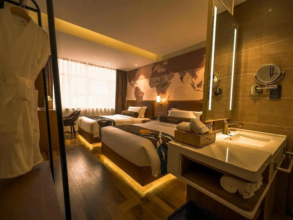 Bed in James Joyce Coffetel Shenyang North Railway Station Qishan Road Metro Station