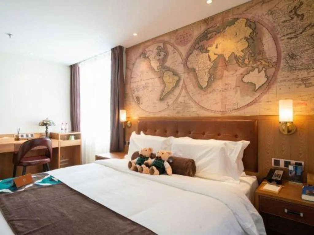 Bed in James Joyce Coffetel Shenyang North Railway Station Qishan Road Metro Station