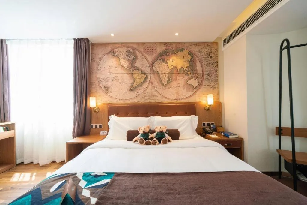 Bed in James Joyce Coffetel Shenyang North Railway Station Qishan Road Metro Station