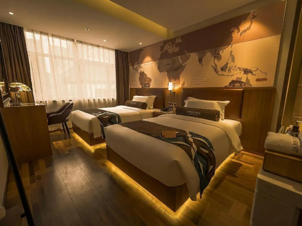 Bed in James Joyce Coffetel Shenyang North Railway Station Qishan Road Metro Station