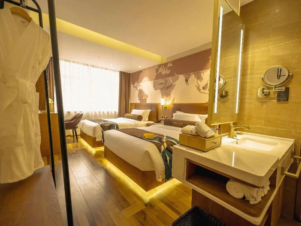 Bed in James Joyce Coffetel Shenyang North Railway Station Qishan Road Metro Station