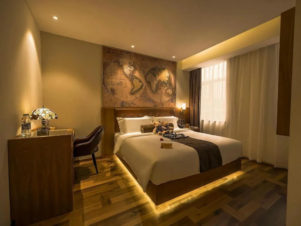 Bed in James Joyce Coffetel Shenyang North Railway Station Qishan Road Metro Station