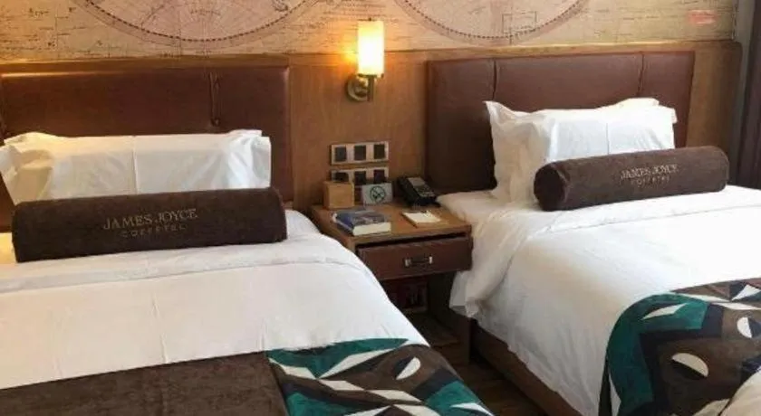 Bed in James Joyce Coffetel Shenyang North Railway Station Qishan Road Metro Station