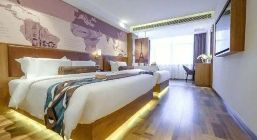 Bed in James Joyce Coffetel Shenyang North Railway Station Qishan Road Metro Station