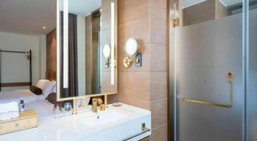 Bed in James Joyce Coffetel Shenyang North Railway Station Qishan Road Metro Station