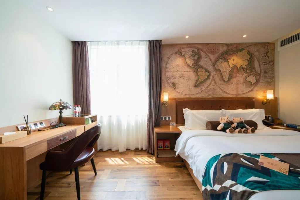 Bed in James Joyce Coffetel Shenyang North Railway Station Qishan Road Metro Station