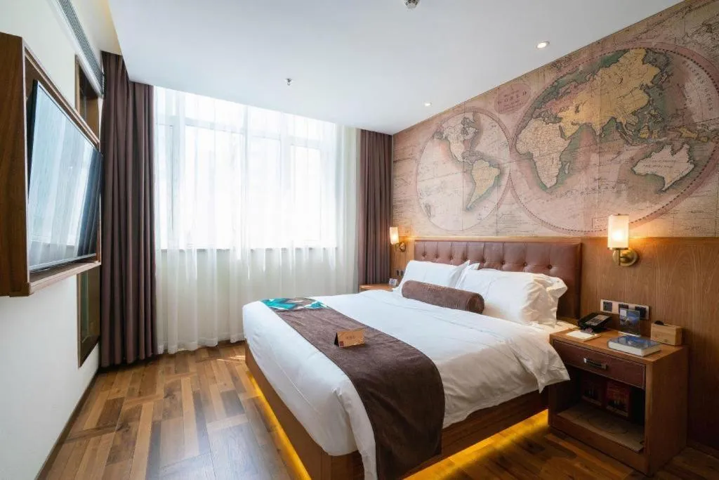 Bed in James Joyce Coffetel Shenyang North Railway Station Qishan Road Metro Station