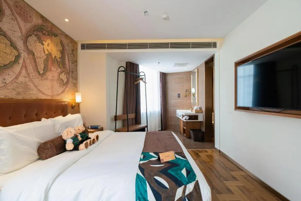 Bed in James Joyce Coffetel Shenyang North Railway Station Qishan Road Metro Station