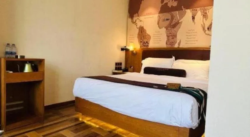 Bed in James Joyce Coffetel Shenyang North Railway Station Qishan Road Metro Station