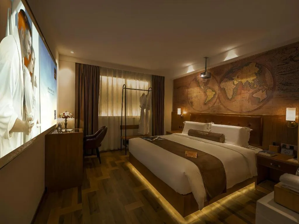 Bed in James Joyce Coffetel Shenyang North Railway Station Qishan Road Metro Station