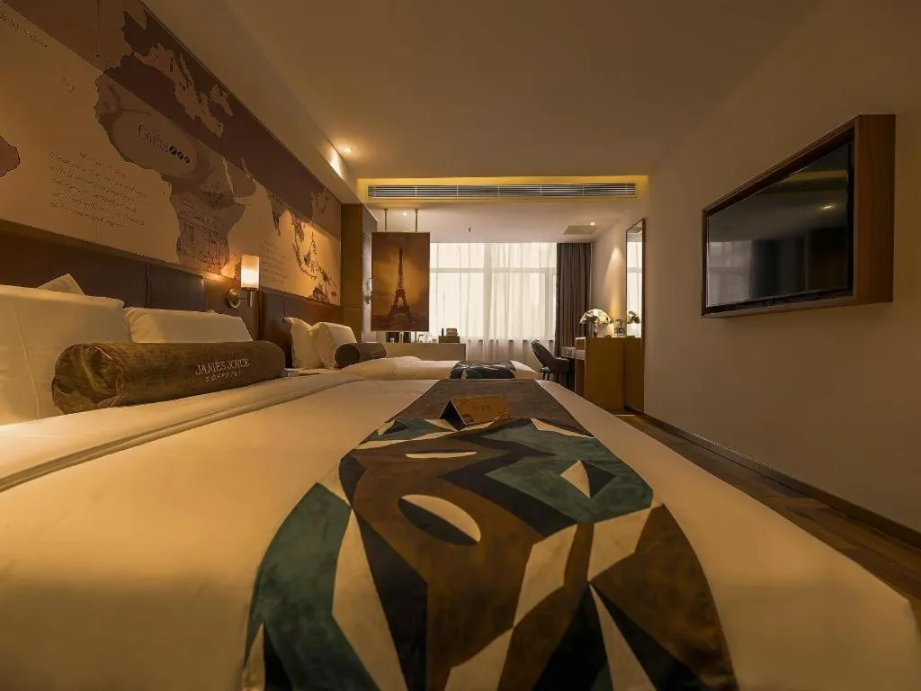 Bed in James Joyce Coffetel Shenyang North Railway Station Qishan Road Metro Station