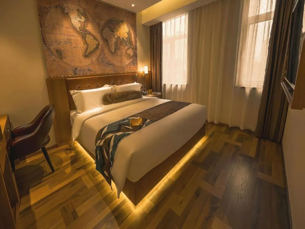 Bed in James Joyce Coffetel Shenyang North Railway Station Qishan Road Metro Station