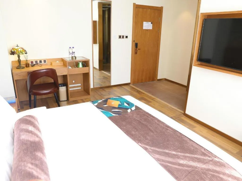 Bed in James Joyce Coffetel Shenyang North Railway Station Qishan Road Metro Station