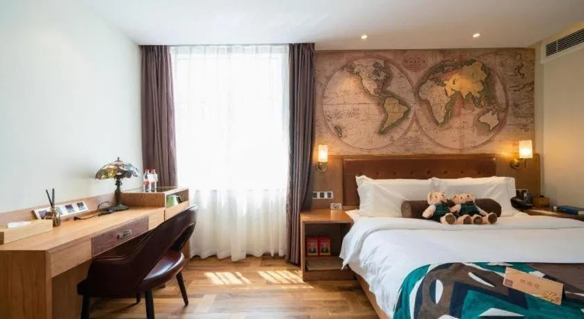 Bed in James Joyce Coffetel Shenyang North Railway Station Qishan Road Metro Station