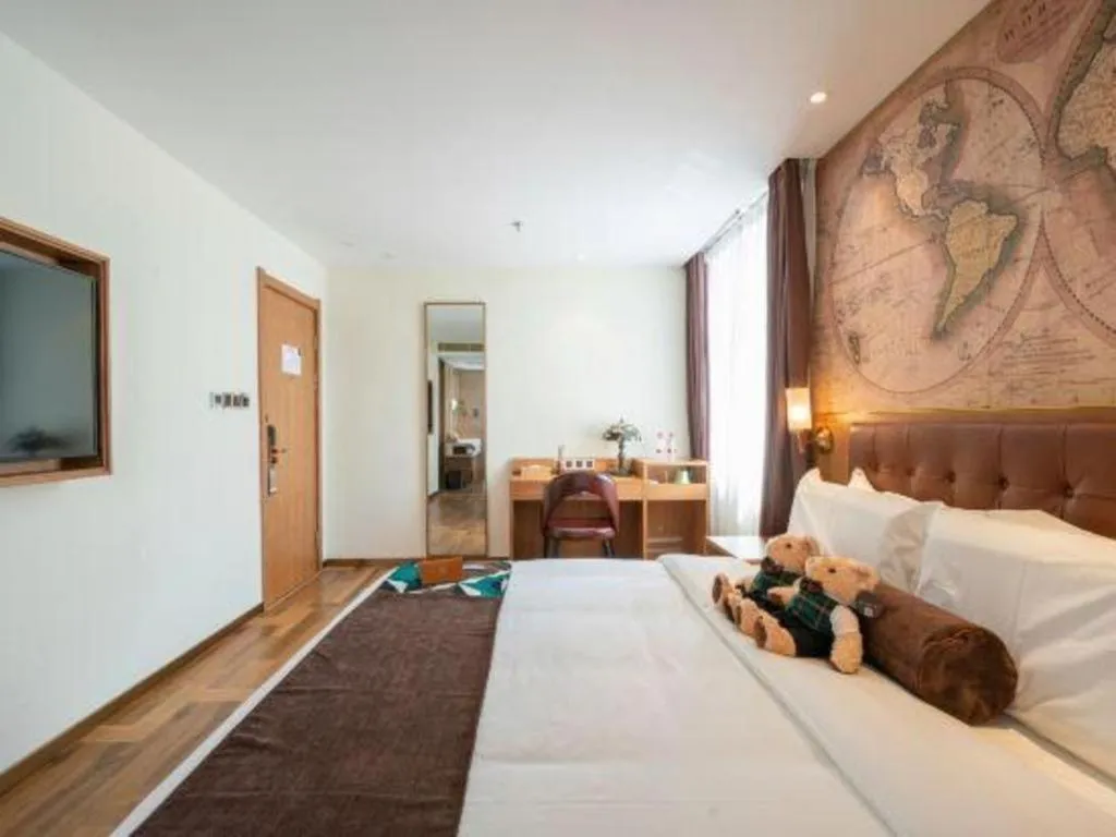 Bed in James Joyce Coffetel Shenyang North Railway Station Qishan Road Metro Station