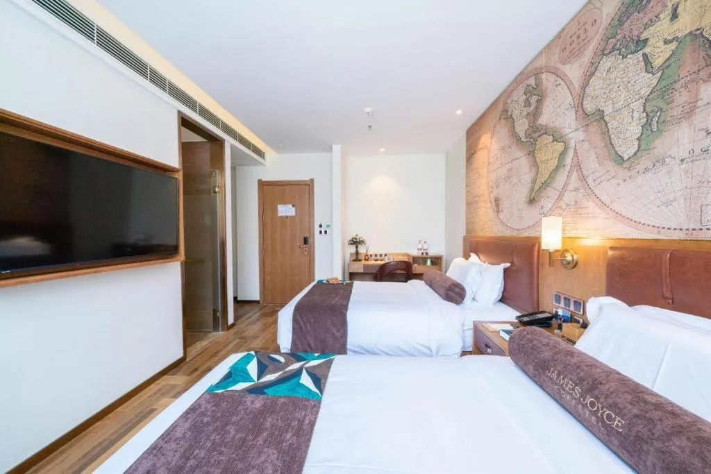 Bed in James Joyce Coffetel Shenyang North Railway Station Qishan Road Metro Station