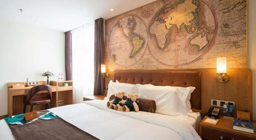 Bed in James Joyce Coffetel Shenyang North Railway Station Qishan Road Metro Station