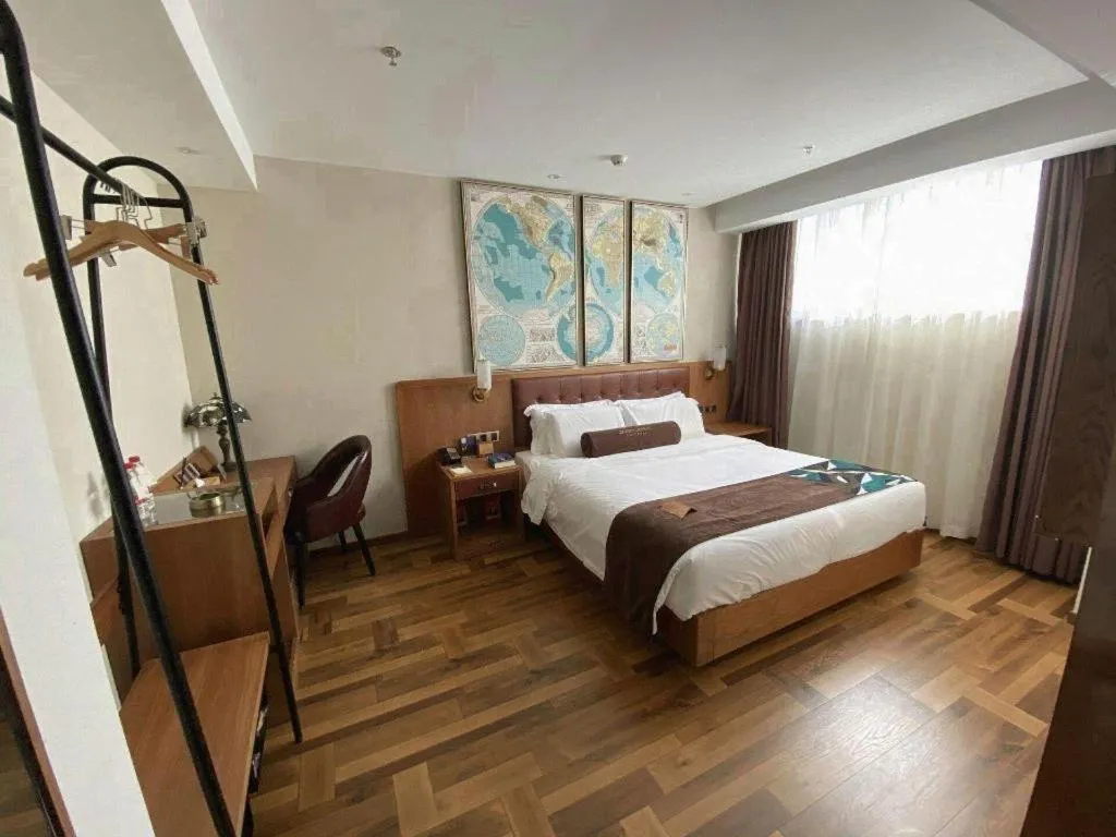 Bed in James Joyce Coffetel Shenyang North Railway Station Qishan Road Metro Station