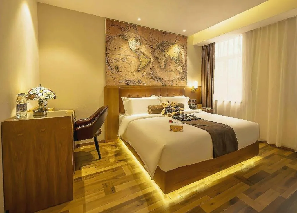 Bed in James Joyce Coffetel Shenyang North Railway Station Qishan Road Metro Station