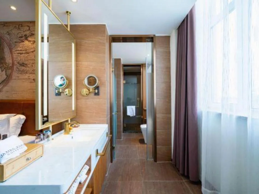 Bed in James Joyce Coffetel Shenyang North Railway Station Qishan Road Metro Station